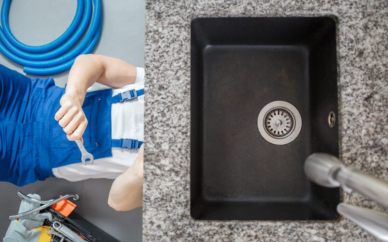 Plumber repairing pipes with wrench