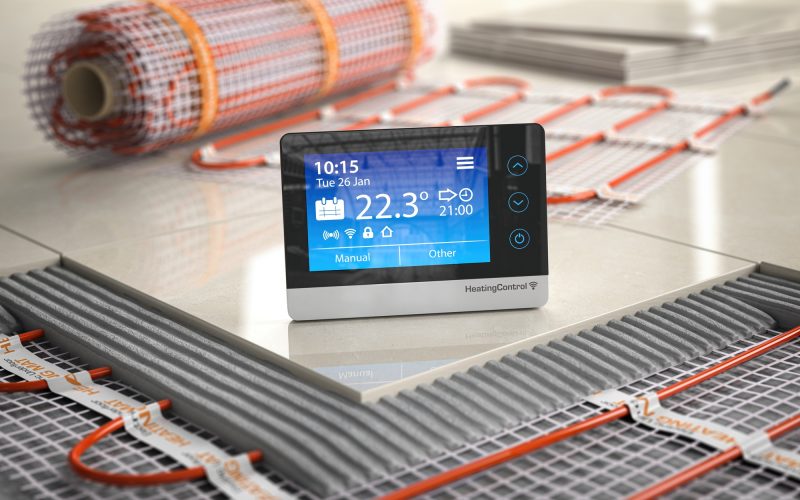 Underfloor heating. Heating climat control thermostat with mat